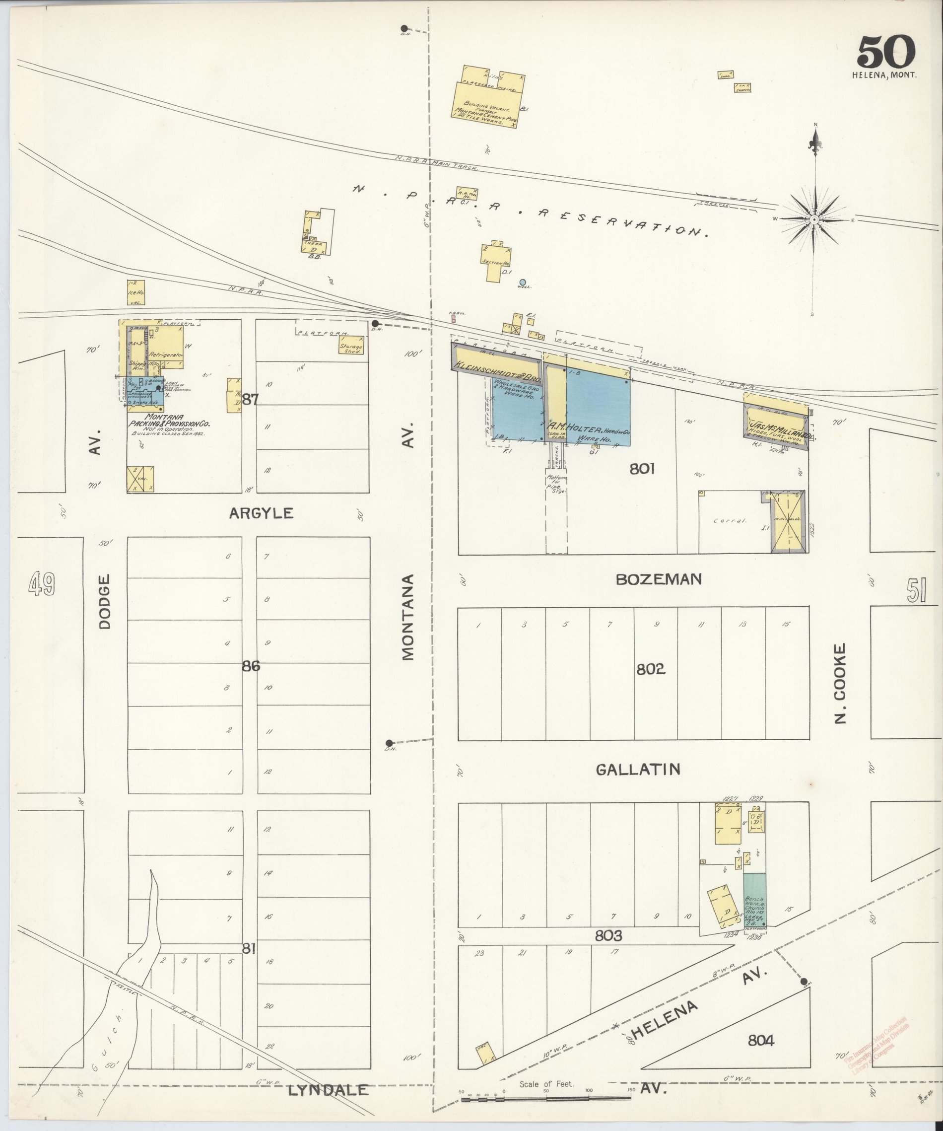 Sheet 50 of the 1892 Sanborn map of Helena: Bozeman Street, the Northern Pacific reservation, the Kleinschmidt & Bro. wholesale grocery and hardware warehouse in blue for stone, A. M. Holter's hardware warehouse beside it, and James McMillan & Co.'s hides and wool house at Cooke Street